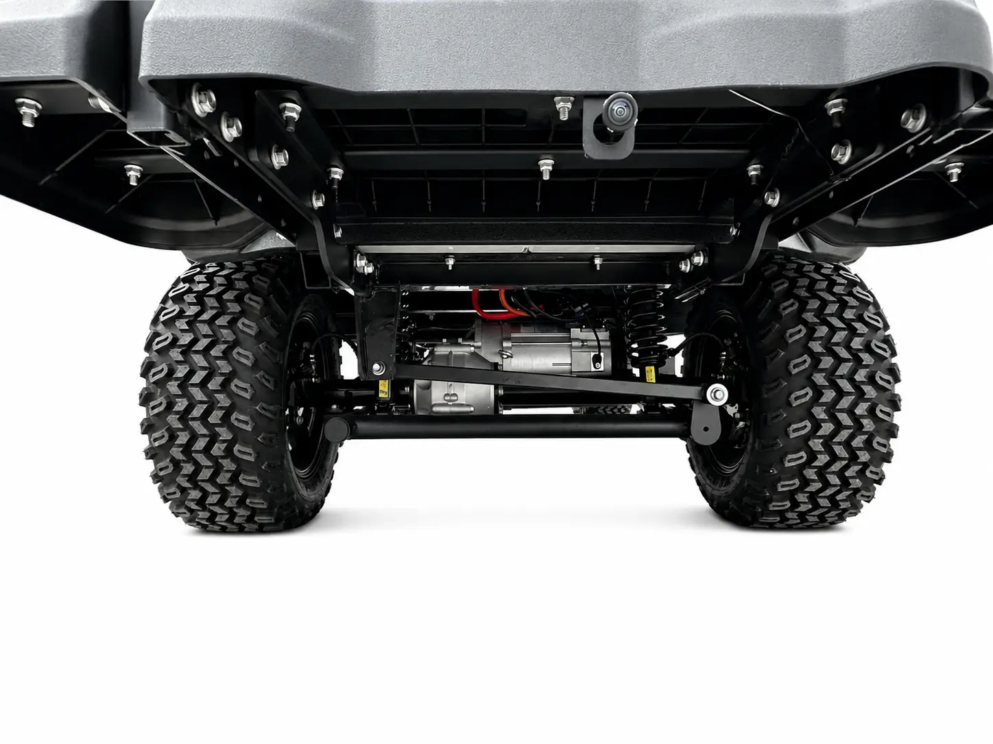 Underside of a G-CART showing the motor, rear axle, suspension and all-terrain tyres